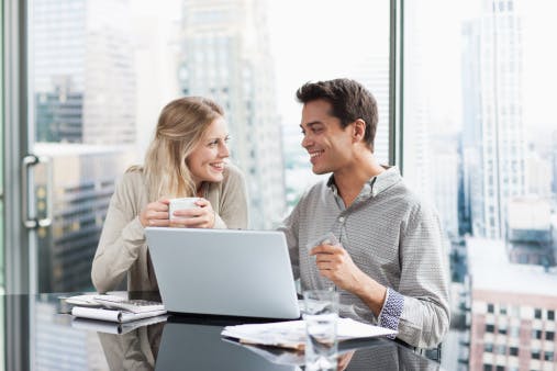 171102331 business people using laptop together gettyimages